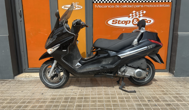 Piaggio X-EVO 125 lleno