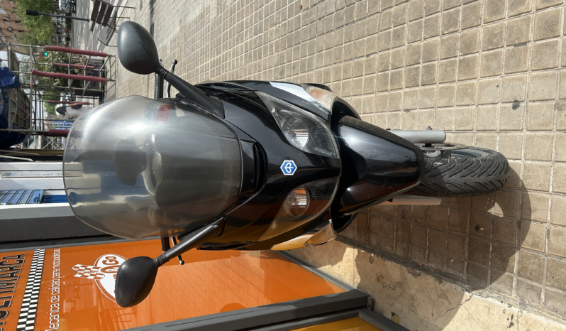 Piaggio X-EVO 125 lleno