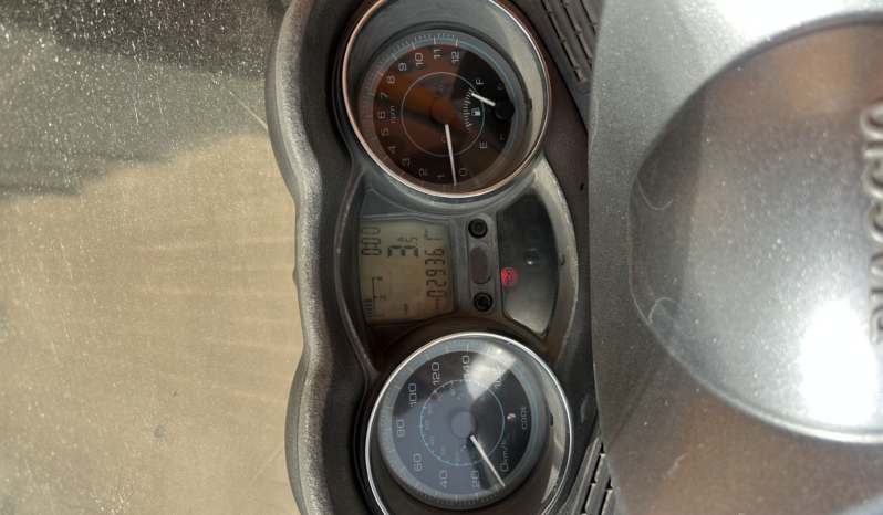 Piaggio X-EVO 125 lleno